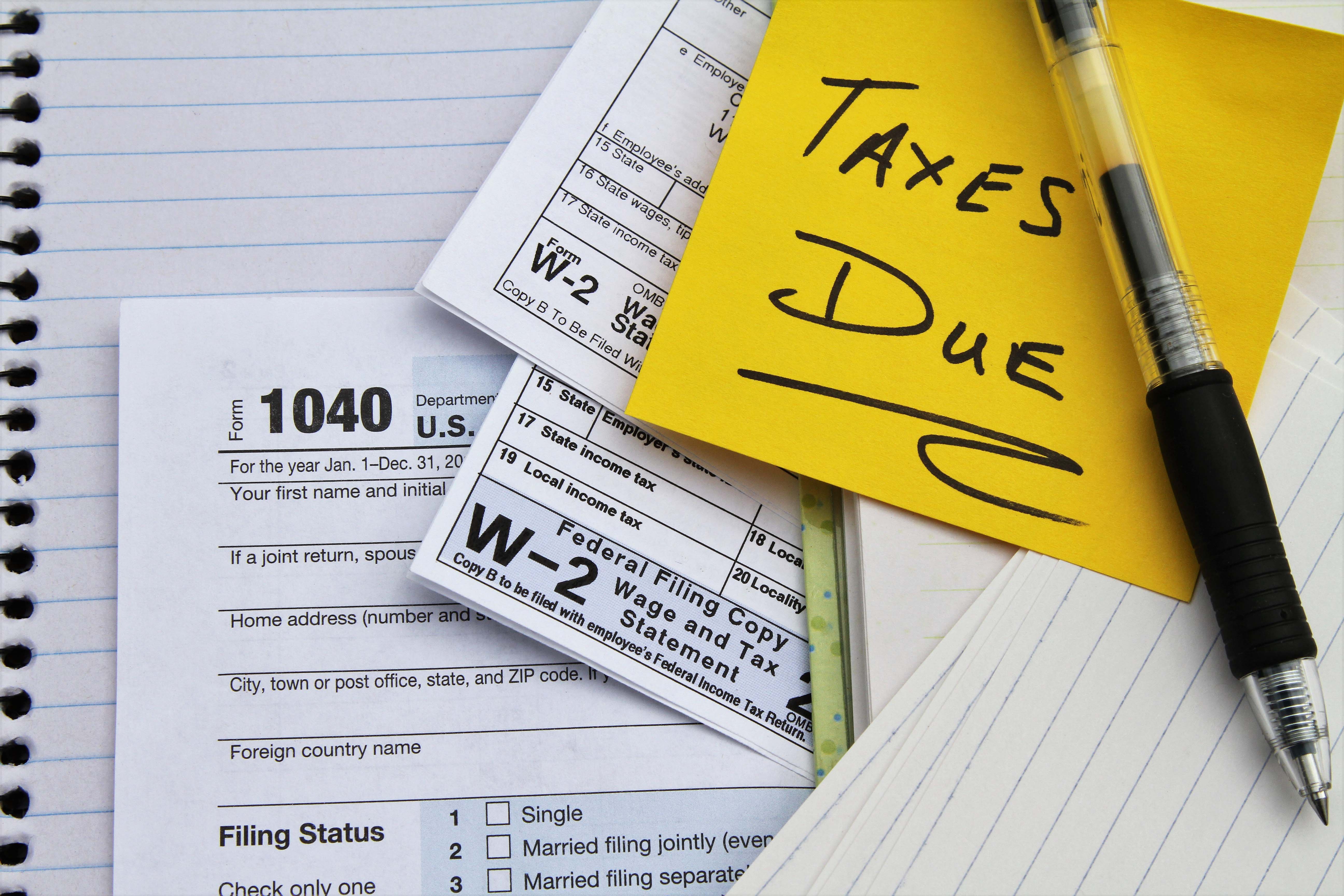 Tax Return Forms And Wage Statements With Note Taxes Due Optima Tax 