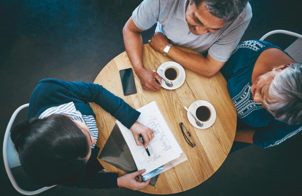 couple with financial advisor